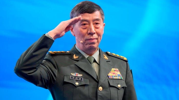 Li Shangfu saluting before delivering a speech Li Shangfu saluting before delivering a speech